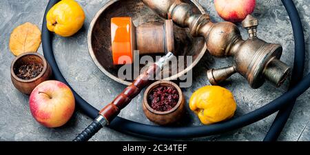 clay bowl with tobacco for smoking hookah side view Stock Photo - Alamy