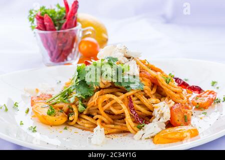 Spaghetti tomato sauce crab - Thai style Stock Photo