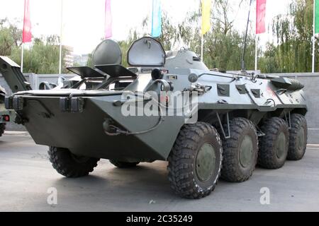 old Soviet Armored troop-carrier on the street Stock Photo