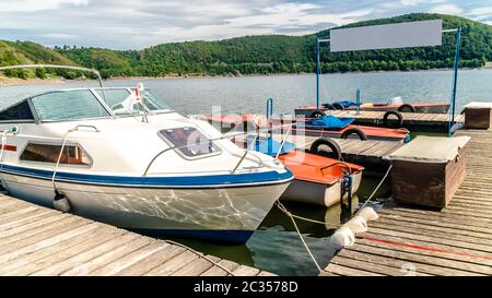 Boats on marina on Edersee in Hessen on a beautiful sunny Day Stock Photo