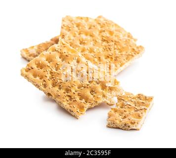 Knackebrot. Wholegrain crispbread with sesame seeds isolated on white background. Stock Photo