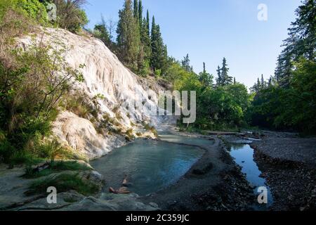 Bagni San Filippo is an area in the Province of Siena, Italy, not far from Monte Amiata. It is a small hot spring which form white concretions and wat Stock Photo