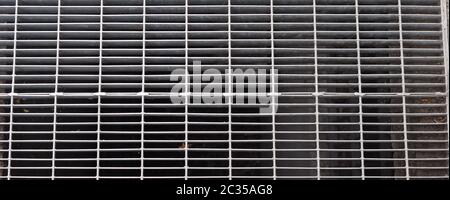 wide grey steel grid texture useful as a background Stock Photo