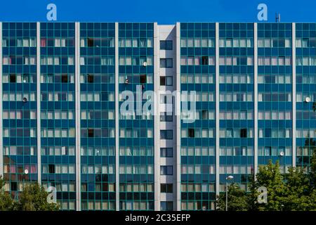 Blue Plattenbau: Facade of a high rise building in Berlin-Lichtenberg Stock Photo