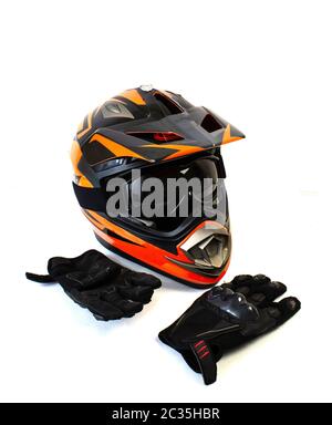 isolated on a white background motorcycle helmet and biker gloves Stock Photo