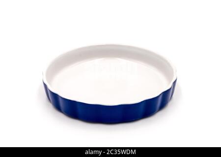 Blue porcelain ramekin on a white background Stock Photo