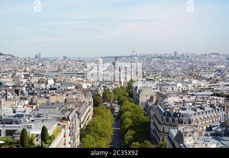 View down Avenue de Friedland from top of Arc de Triomphe, towards Saint-Augustin church. The Hertzienne communications tower stands 141 metres high o Stock Photo