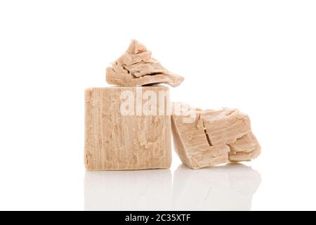Yeast blocks isolated on white background. Stock Photo