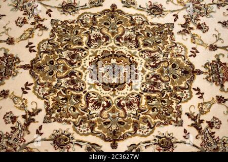 Beautiful colorful abstract eastern pattern on carpet. Stock Photo