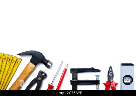 Top view of carpenter's tools on white background. Construction industry, do it yourself. Text space. Stock Photo