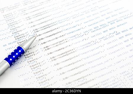 Printed on paper SQL code technology background Stock Photo