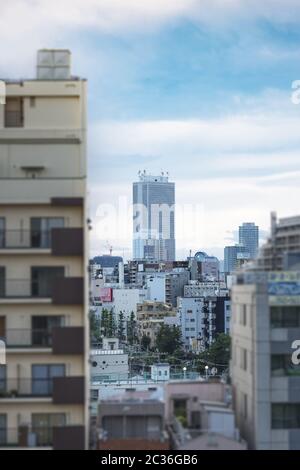 View of Sunshine building in Ikebukuro from Komagome station in Tokyo in Japan. Stock Photo