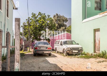 Old crashed cars in the Muslim Quarter Bo-Kaap, Cape Town, South Africa Stock Photo