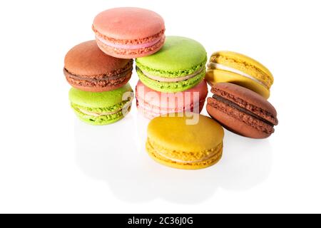 Several macaroons isolated on white background, close view. Stock Photo