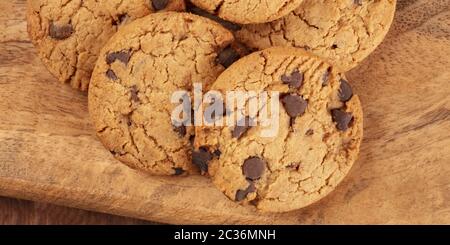Chocolate chip cookies panorama on a rustic wooden background Stock Photo