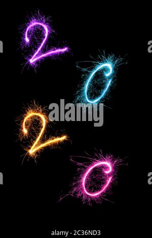 Happy new year. Digits 2020 made from fireworks isolated on black background. Stock Photo