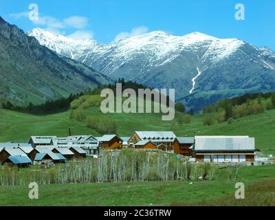 Hemu Village, a small village inside the beautiful Altay mountain range in Xinjiang China. Stock Photo