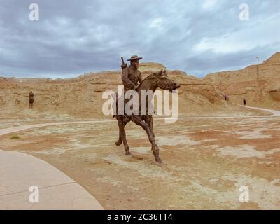 Sculptures made of bronze depict story of desert live in Devil city, an arid tourism destination with ghost story in desert Urho, Xinjiang China. Stock Photo