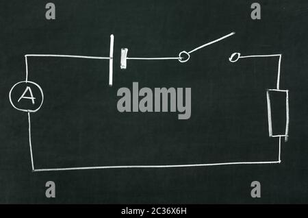 The electrical diagram drawn on a blackboard with chalk Stock Photo