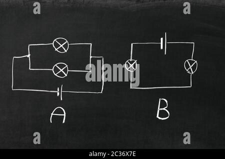 The electrical diagram drawn on a blackboard with chalk Stock Photo