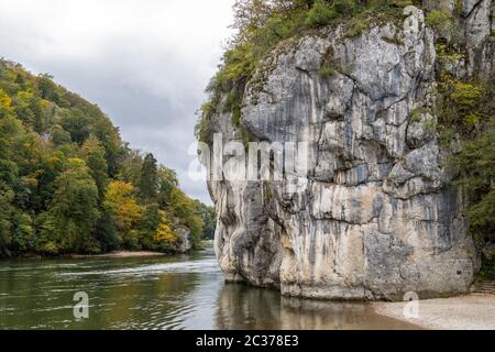 Nature reserve at Danube river breakthrough near Kelheim, Bavaria, Germany in autumn with limestone rock formations and plants with colorful leaves, a Stock Photo