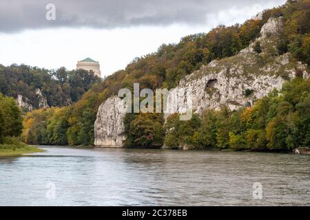 Nature reserve at Danube river breakthrough near Kelheim, Bavaria, Germany in autumn with limestone rock formations and Befreiungshalle on the Michels Stock Photo