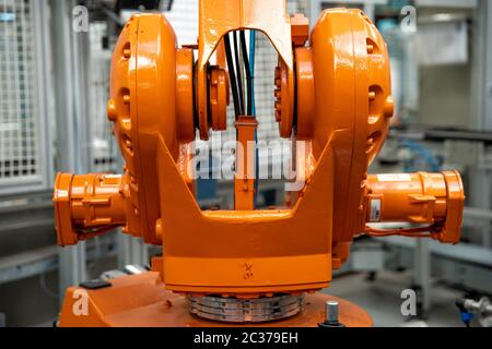 Detail of a robotic arm in a factory, auto industry. Stock Photo