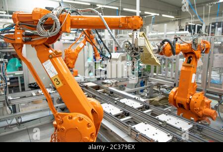 robotization of modern industry in the factory. New program industry 4.0 Stock Photo