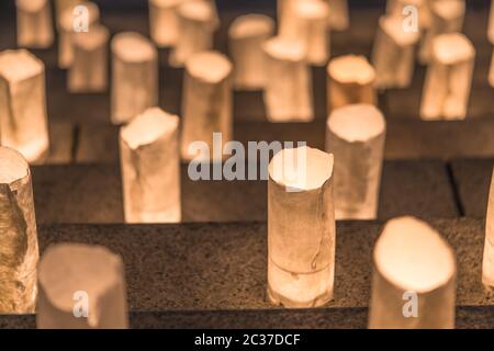 Handmade japanese paper washi lanterns illuminating the steps of the Zojoji temple near the Tokyo To Stock Photo