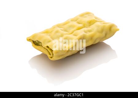 Single swabian dumpling maultasche ravioli white isolated Stock Photo