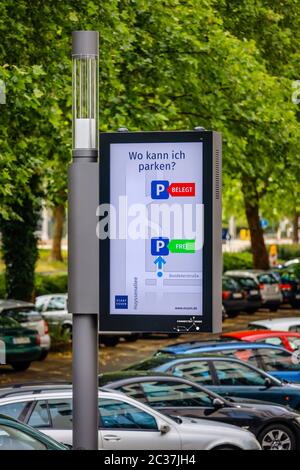 Essen, Ruhr Area, North Rhine-Westphalia, Germany - Smart Poles, intelligent street lamps are parking attendants, free charging station for electric c Stock Photo