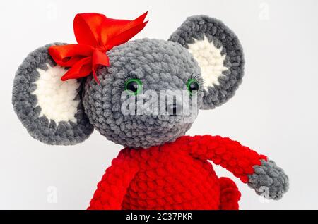 Portrait of a teddy mouse with a red bow on its head Stock Photo