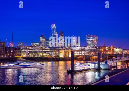 A view of the London skyline across the River Thames in London Stock Photo