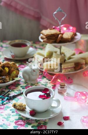 Traditional English tea party in a fabulous decoration. Rustic style. Stock Photo