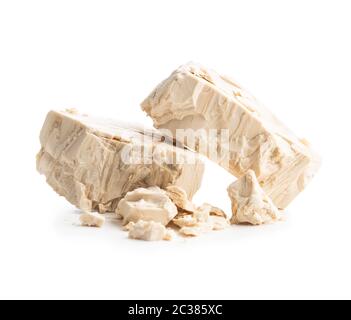 Fresh yeast blocks isolated on white background. Stock Photo