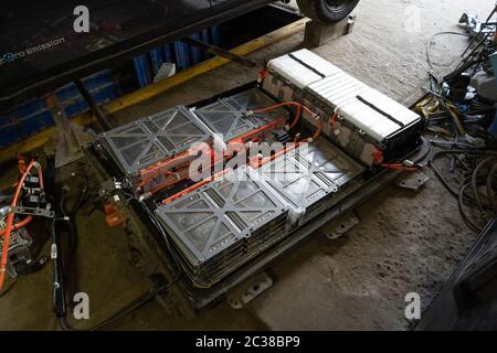 Removed battery from a Nissan Leaf car with zero emissions. Cells of the high-voltage battery of an electric vehicle. Service station. May 2019 Kiev Stock Photo