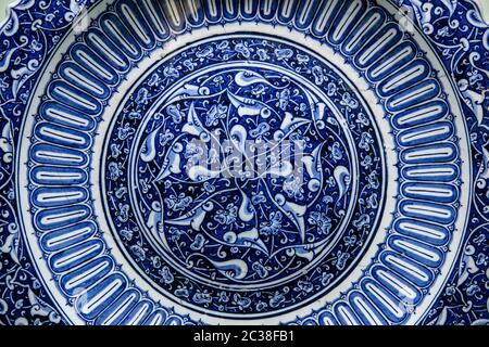 Texture of ceramic tiles in oriental East style. Turkish ceramic tiles lined on the wall. Old azulejo pattern floral ornament on Stock Photo