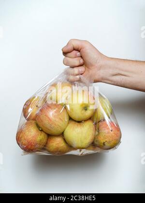 some apples in a plastic bag Stock Photo