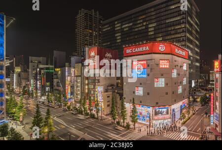 TOKYO, JAPAN - July 11 2018: Aerial night view of the Akihabara Crossing Intersection in the electri Stock Photo