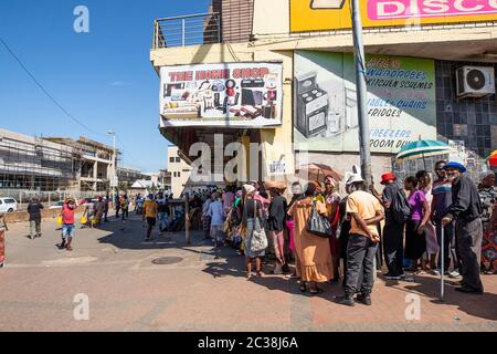 People queue in Durban during the Corona Virus Pandemic Stock Photo