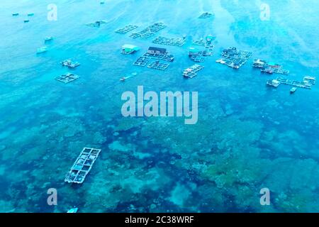 Fish farm in coastal waters. Rectangular cages for fish and crustaceans. Stock Photo