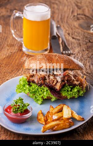 pulled pork in a bun with beer Stock Photo