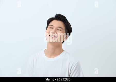 Portrait of a young Asian man making a confident smile Stock Photo