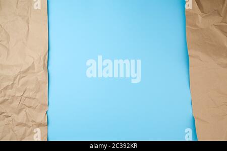 Retro brown paper torn, great design for any purposes. Abstract texture. Blue banner, copy space. Stock Photo