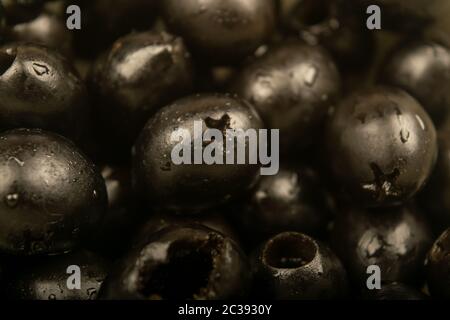Black olives without seeds. Close up. Surface texture Stock Photo