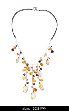hand crafted necklace decorated by chains with natural citrine and cornelian gemstonesa and pearls red isolated on white background Stock Photo