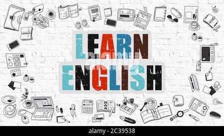 Learn English Concept. Multicolor Inscription on White Brick Wall with Doodle Icons Around. Modern Style Illustration with Doodle Design Icons. Learn Stock Photo