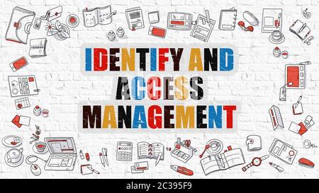 Identify and Access Management. Multicolor Inscription on White Brick Wall with Doodle Icons Around. Modern Style Illustration. Identify and Access Ma Stock Photo