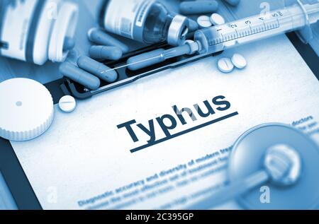 Typhus - Printed Diagnosis with Blurred Text. Diagnosis - Typhus On Background of Medicaments Composition - Pills, Injections and Syringe. Toned Image Stock Photo