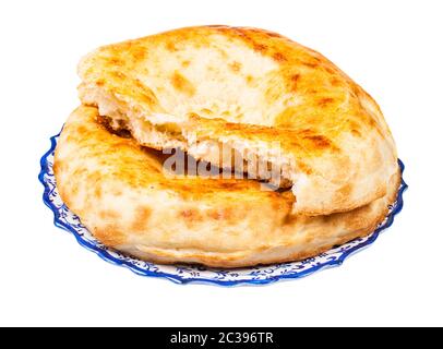Tandyr nan Uzbek bread, a type of Central Asian bread, often decorated by  stamping patterns on the dough by using a bread stamp known as a chekich,  al Stock Photo - Alamy